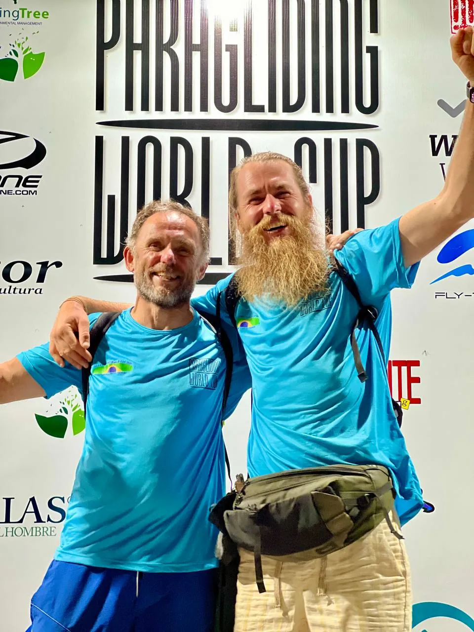 Anatolii Mykhailiuta (right), senior instructor at SkyAtlantida, at a Paragliding World Cup round